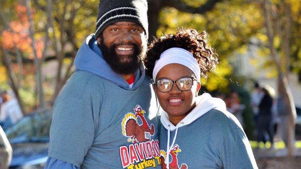Davidson Turkey Trot Runners Holding Medals